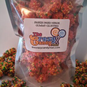 Colorful candy clusters in a clear bag labeled The Crazy Candy Company.